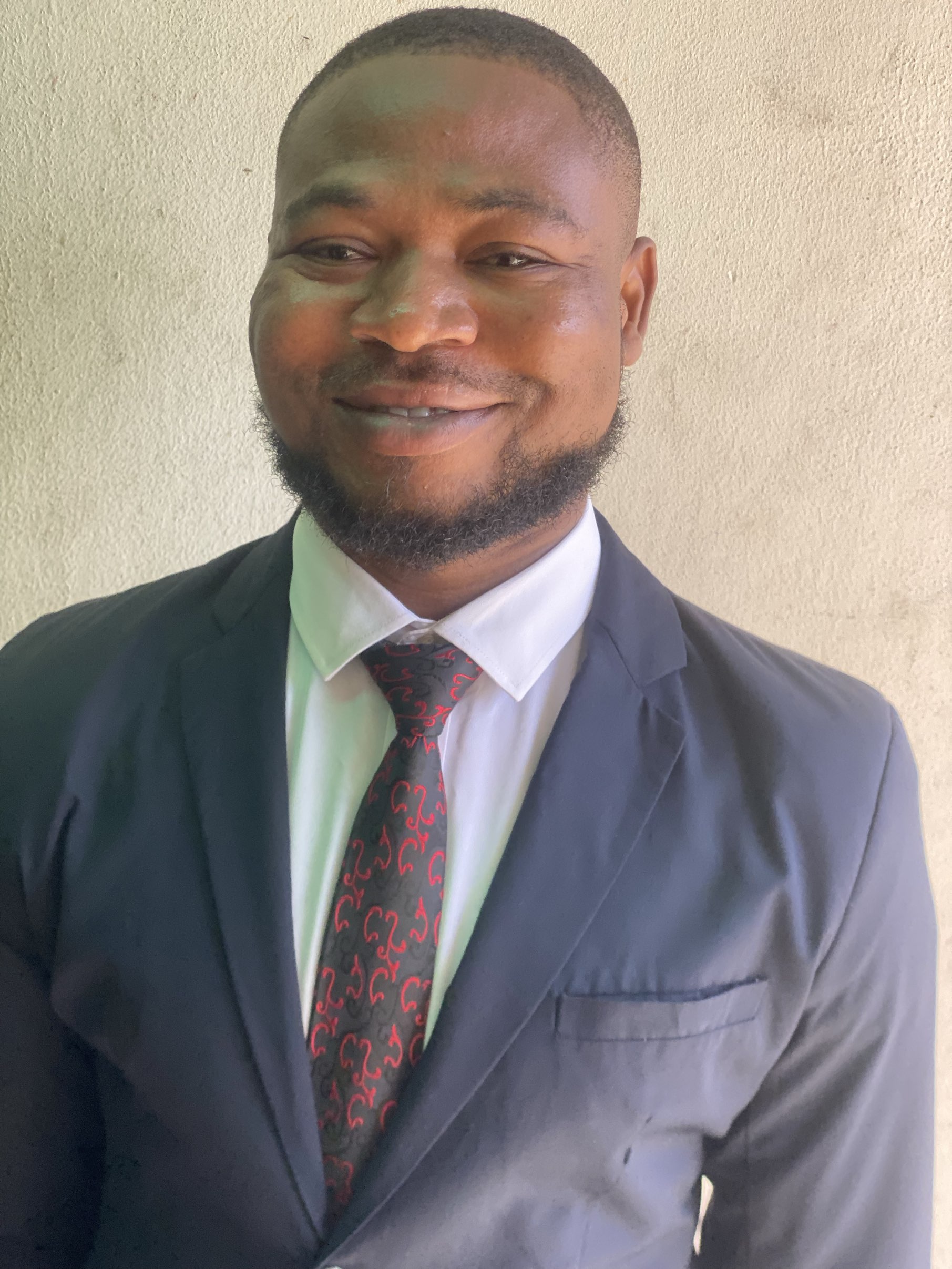 Aje Simon Ajine - Corporate Executive